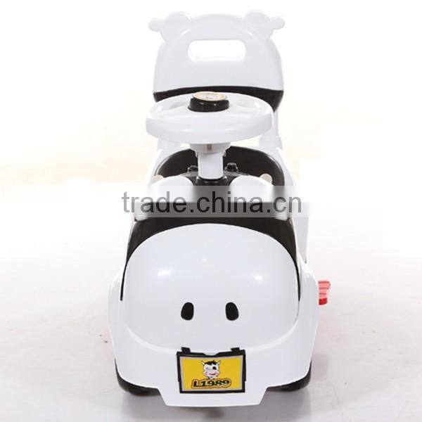 Hot sales CE approved children swing car,4 wheels cartoon cow children tricycle bicycle toys baby swing car with music