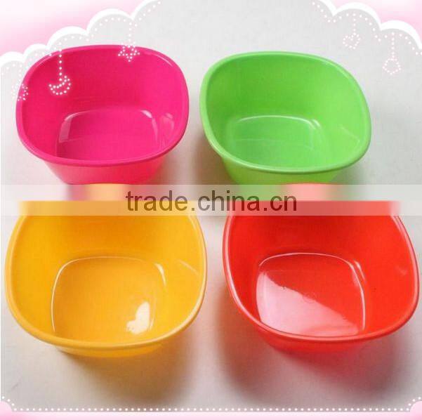 plastic orange and food bowl