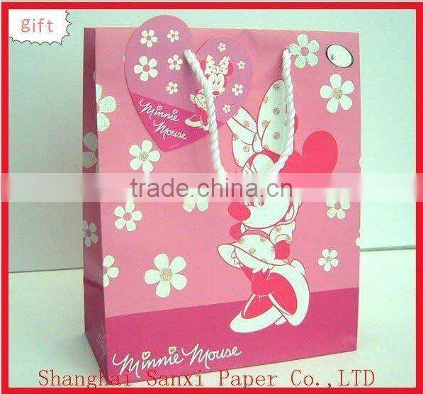 Fashionable printed coated paper packaging bag