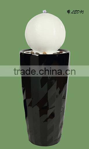 Red glaze ceramic wishful bottles of gold at the end water fountain