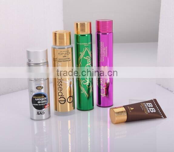 labeling collapsible empty tube with champagne aluminium cap