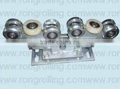 automatic carriage gate rollers