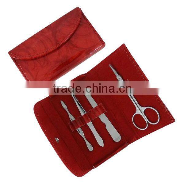 Red PVC pouch carbon steel manicure set in a purse