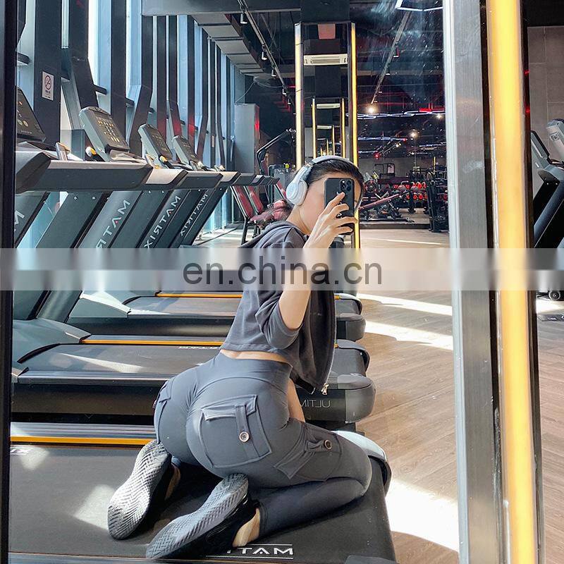 Wholesale sexy peach fitness pants women's tooling high-waist hip-lifting elastic tight-fitting yoga pants