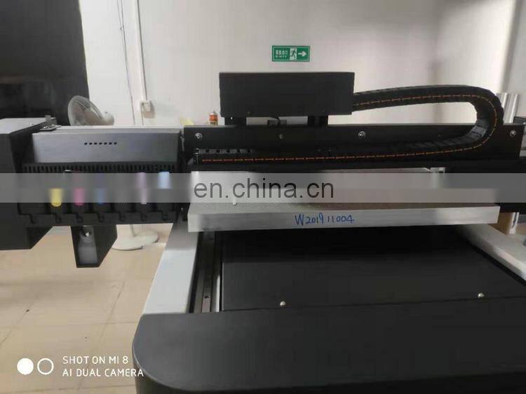 Hot sale Economical 6090 UV flatbed printer (with 2pcs xp600 head , Photoprint ,CMYKLcLm W,1pc uv led lamp )