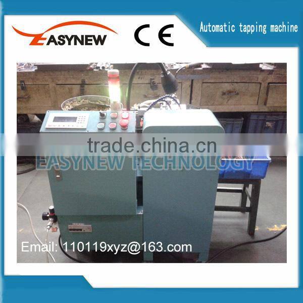 Automatic nut tapping equipment