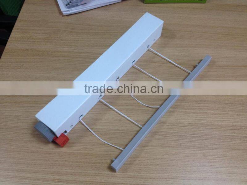 Indoor ABS plastic shell material Retractable rotating clothing rack