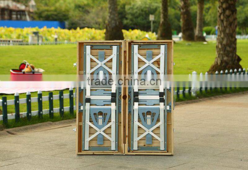 Wooden folding picnic table and chairs