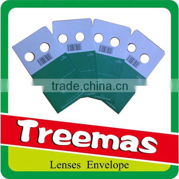 Lenticular aspherical padded envelope optical lens package with holes