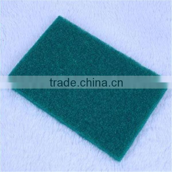 green scouring pad with synthetic fiber on one side