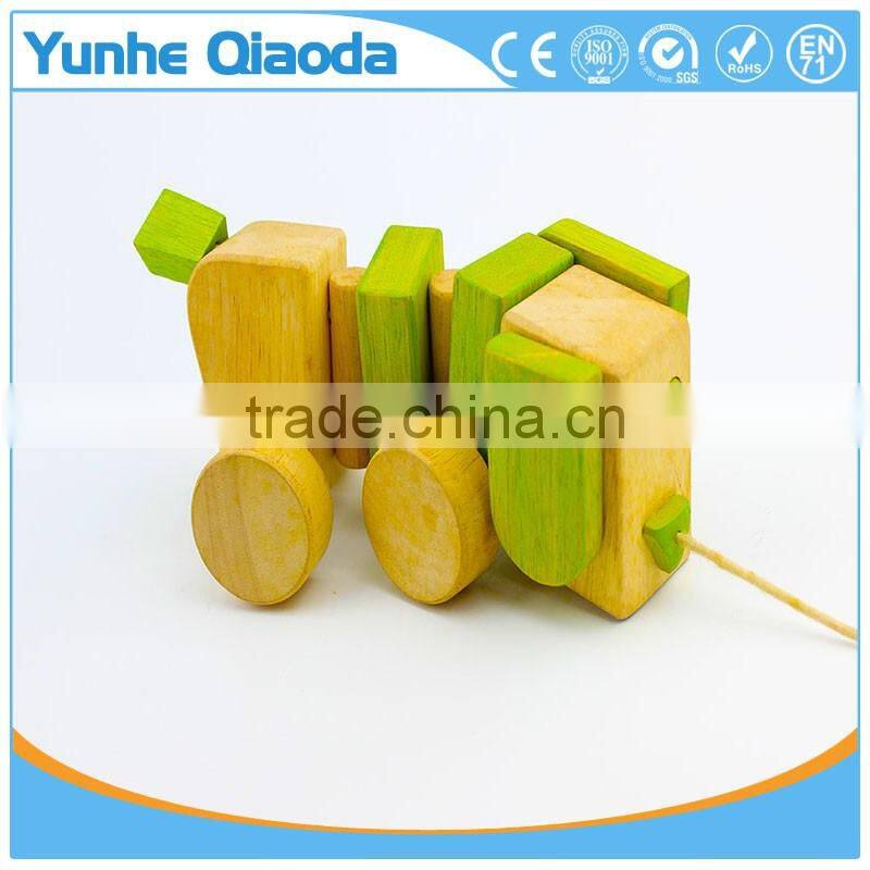 Pull Along Dog Wooden Toy wiggles as you pull they make a clicking sound and make a fun baby