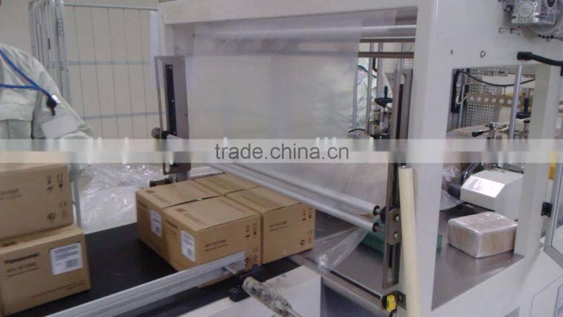 High speed fully automatic shrink wrapping machine