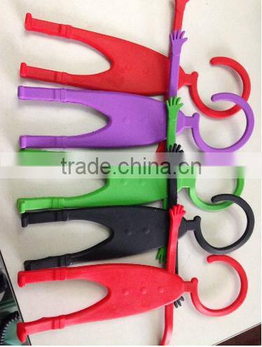 Phone Partner = flexible cell phone holder human hanger design