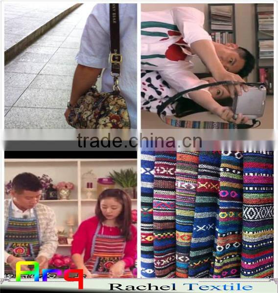 Multi colored fabric with many bright color, stripe design using for home textile or garments