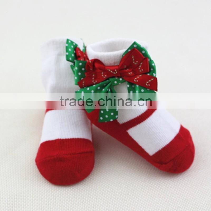 Customized happy cute Christmas baby socks with bowknot for holiday made of cotton