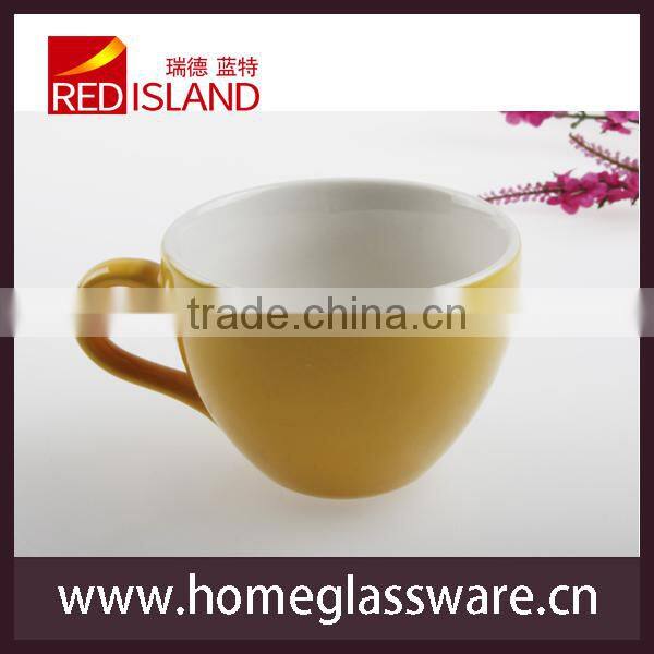 small colored ceramic coffee mug