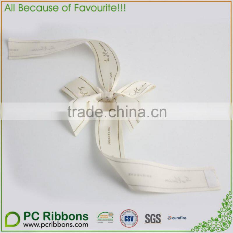Gift packaging with blue ribbons and bow