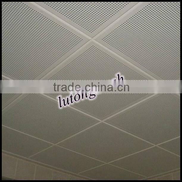 Perforated metal sheet for building cladding and ceiling usage