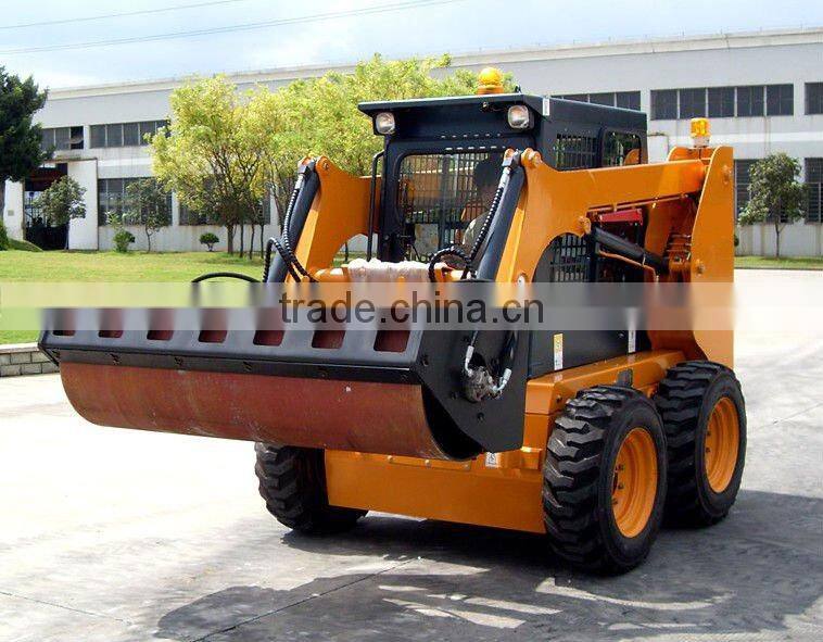 Vibratory roller for skid steer loader