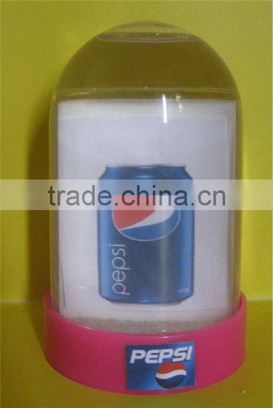 Plastic snow globes with photo insert