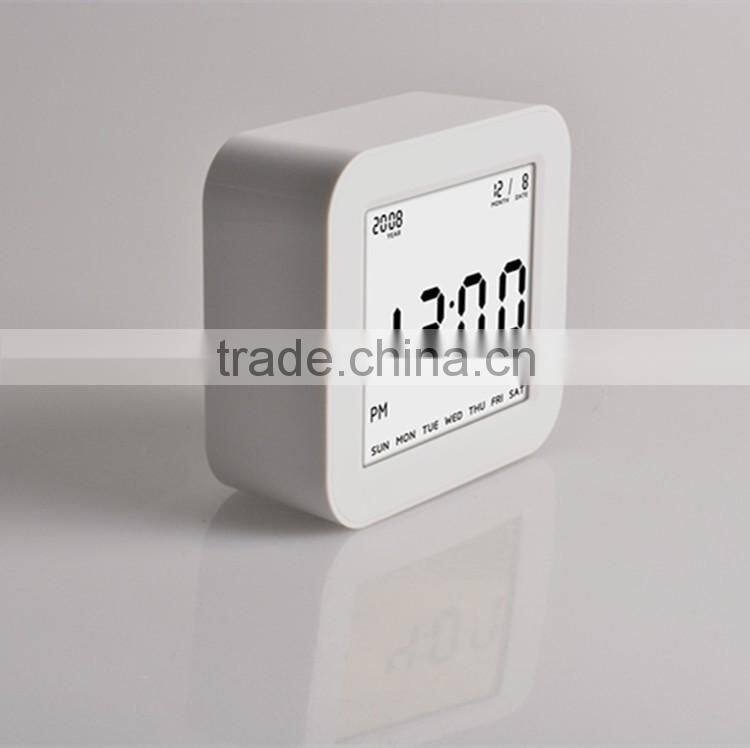 Best Teenager Home Promotional Gift OEM Multi-function Smart Digital Rotation Control Auto Light LCD Bedside Alarm Table Clock