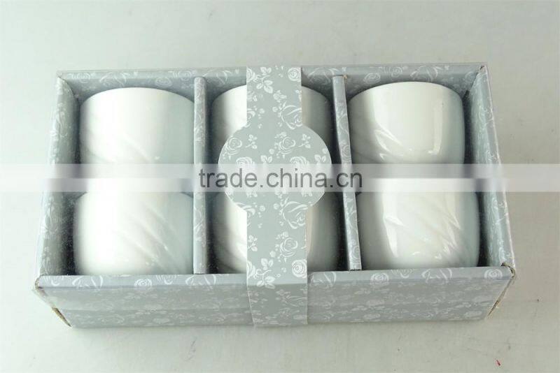 white porcelain cup embossed wave design