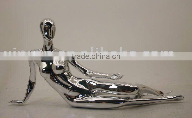 Chrome fashion lying female mannequin