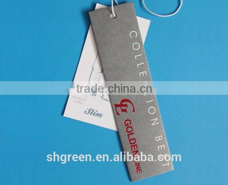 Center fold paper hangtag with plastic string tags for jeans denim