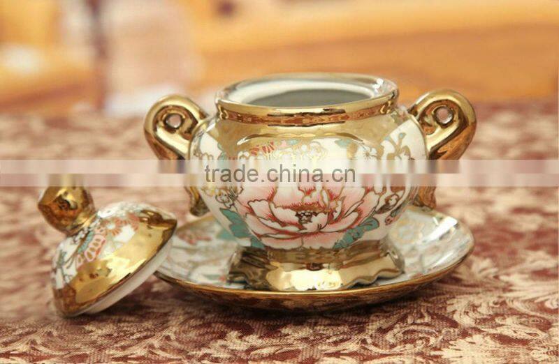 Hot sell electric golden porcelain tea Set teapot sugar bowl creamer cups and saucers Metal holder 15 Pcs 17pcs tea set