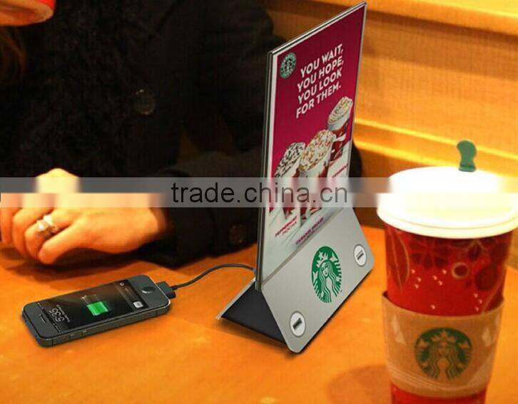 Menu holder with power bank on its base for restaurants/coffee shops/bars