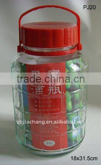 Red plastic lid for large glass beverage dispenser
