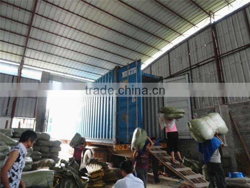 grass broom with short wooden handle