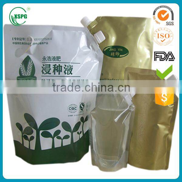 Stand up clear plastic wine pouch with spout