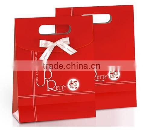 Beauty paper gift bag with polyester rope, pink print and nice design,OEM orders are welcome