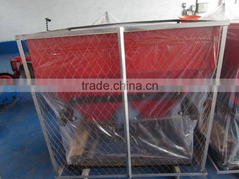 Agricultural tractor mounted broadcast sower