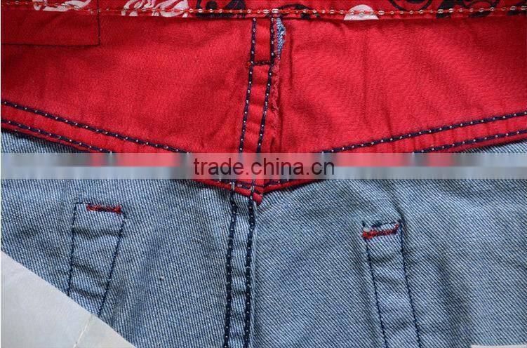 2015 Ripped Slim100% Cotton Jeans top fashion men designer jeans stock men stone washing hole blue jean trouser with opera face