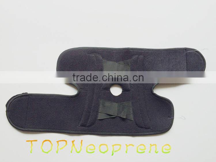 Compression neoprene knee support with adjustable spring support