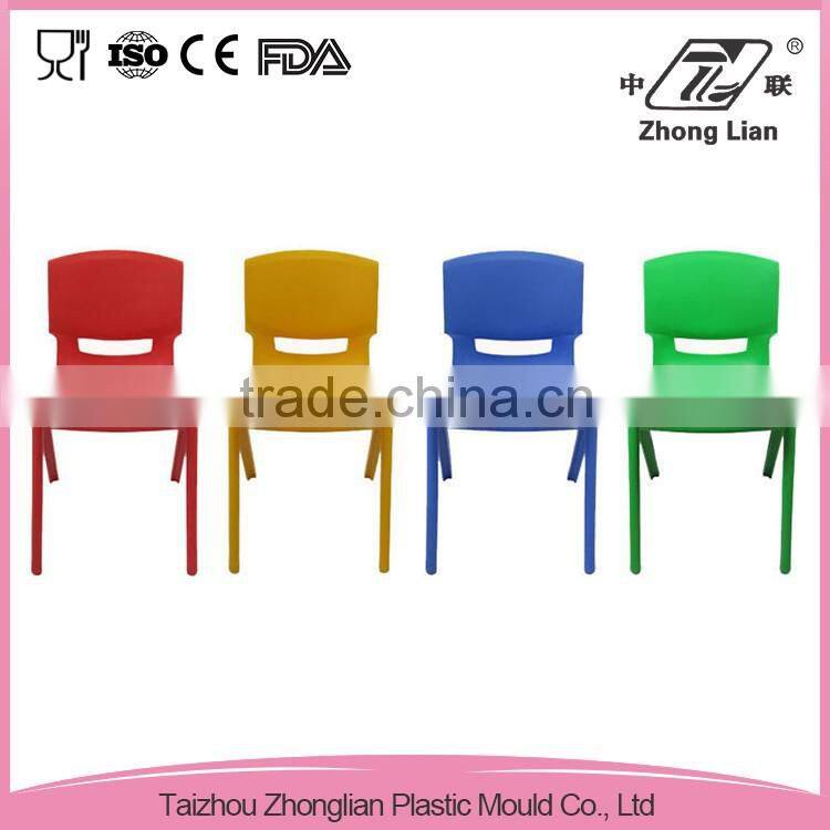 Yellow plastic adirondack chair