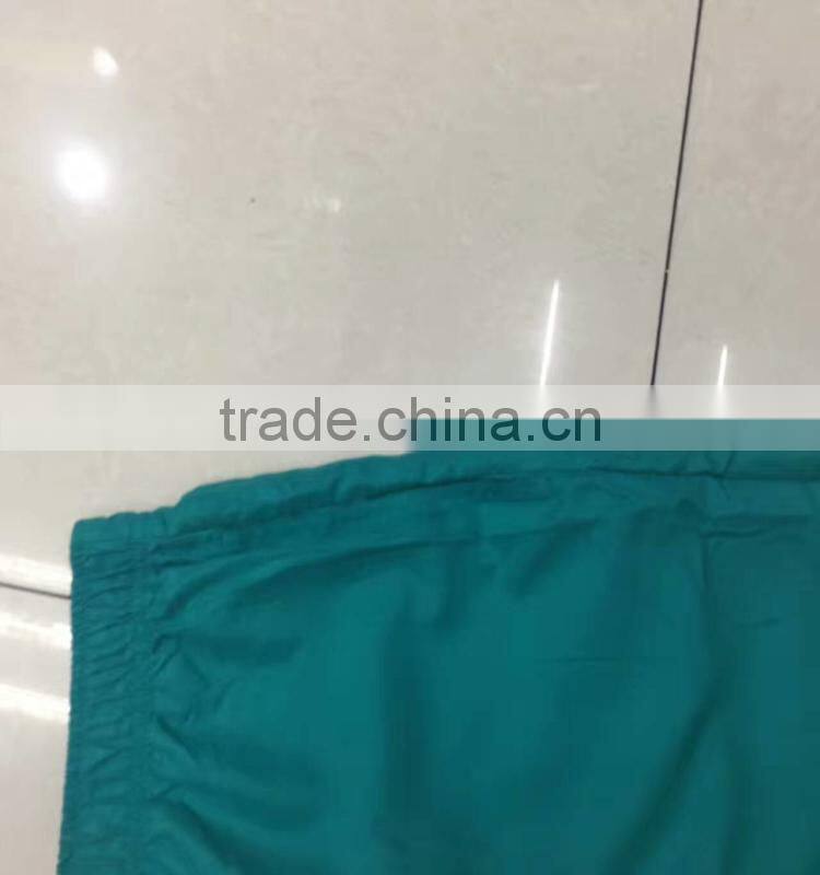 China stocklots men 100%polyester pure color bermuda shorts