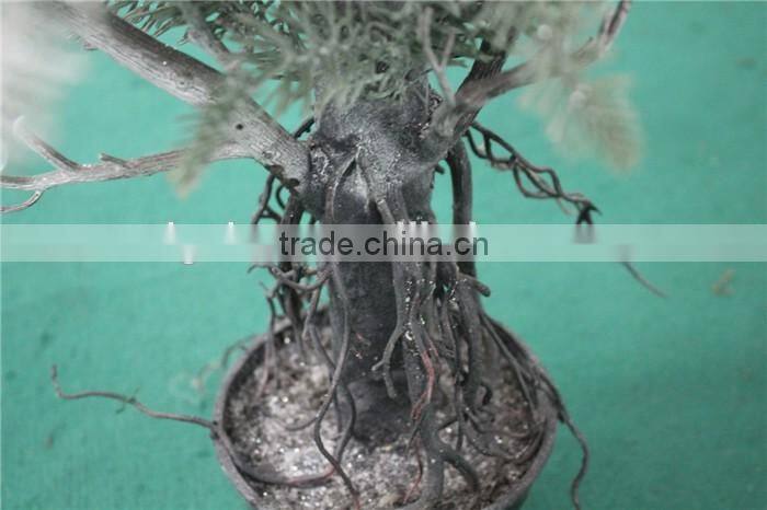 Holy and pure artificial Christmas tree in pot