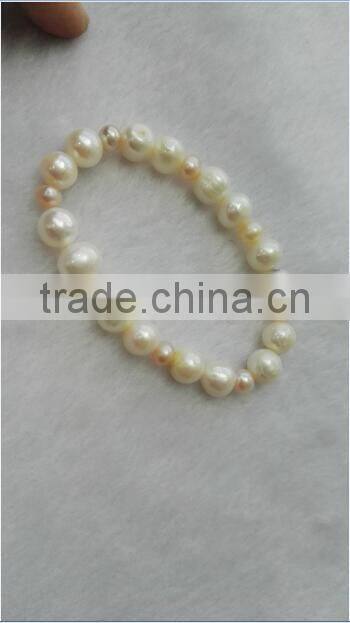 hot selling 3-4mm pink and 7-8mm white freshwater pearl bracelet