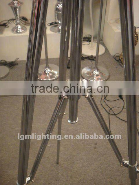 Black marine floor lamp with stainless steel shade and beech wood base