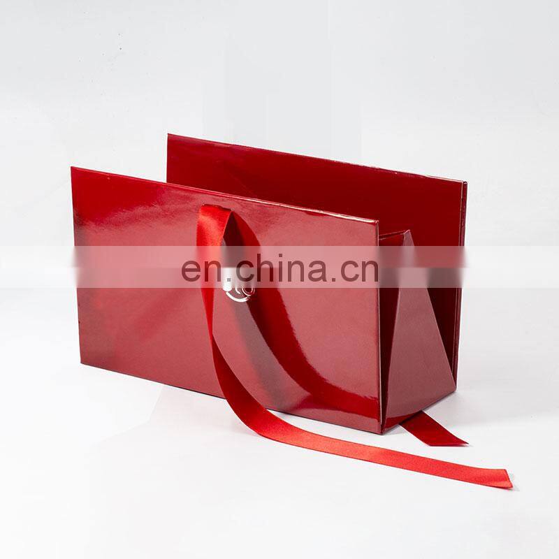 Custom brand logo printing creative red foldable triangle rigid cosmetic gift packaging box with ribbon bow