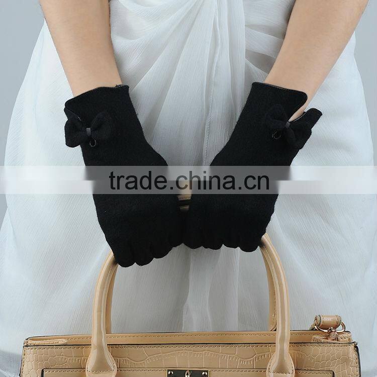magic knitted woolen glove with matching bow tie on vent