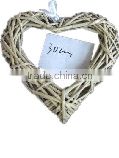 hanging white wicker heart for Christmas and wedding decorarion