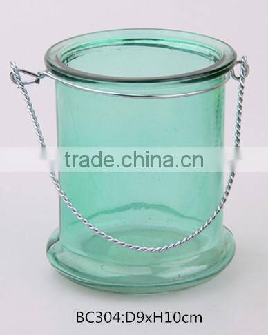 colorful glass jar with metal lifting handle