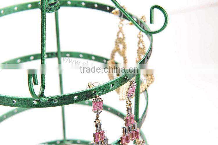 Metal display stand for jewelry with a birdcage for earrings