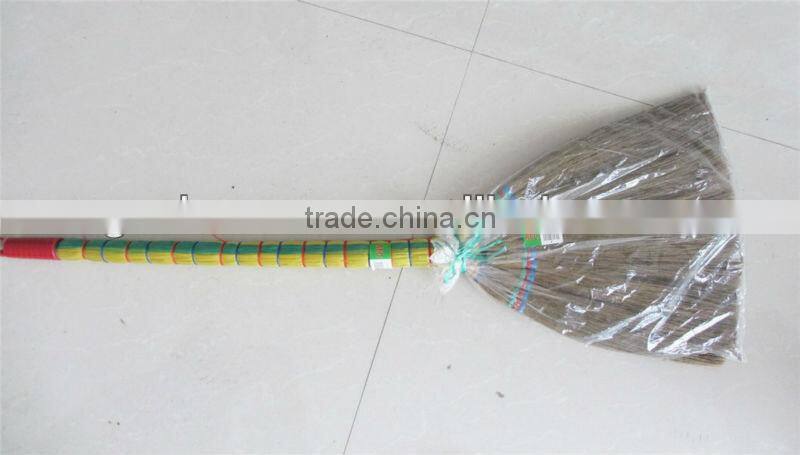 grass broom with short wooden handle
