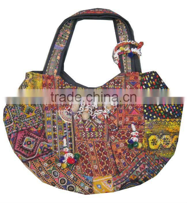 tribal ethnic bags with embroidery, tassels, pom-pom and coin