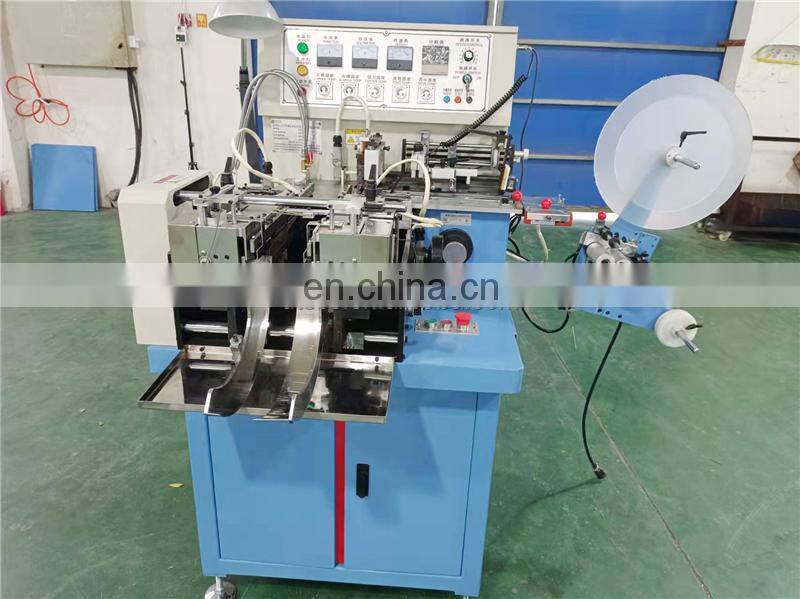 US4000 Auto hot cold knife cotton webbing ribbon garment nylon label cutting and folding machine with triangle middle fold